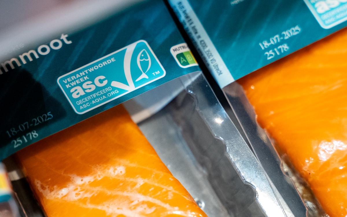 Packaged salmon fillets displaying asc certification and expiration dates