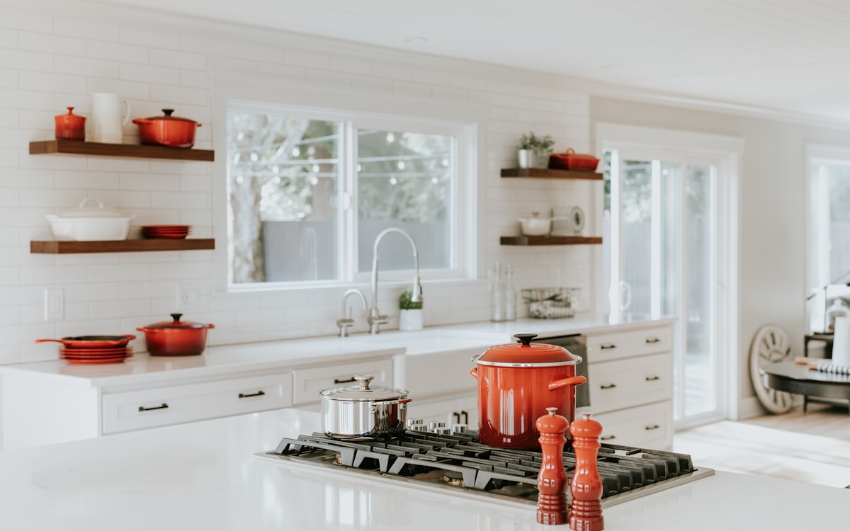 Peppermill beside cooking pots