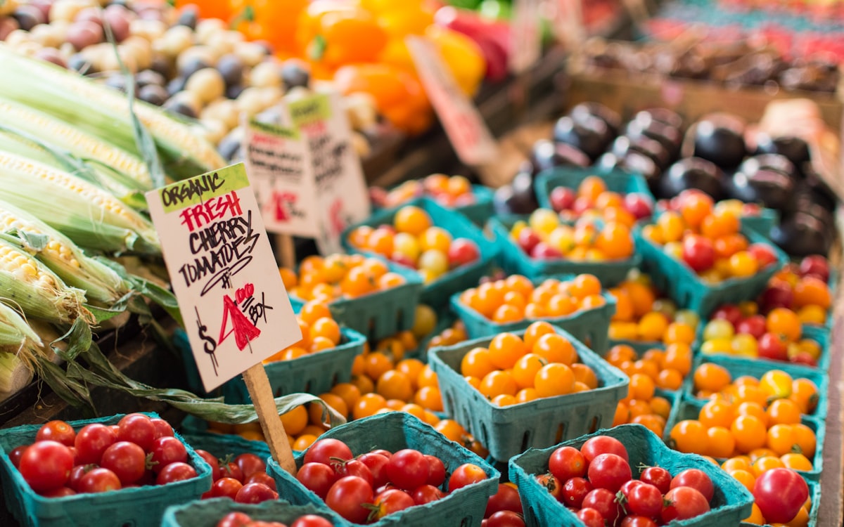 Red tomato lot on blue baskets