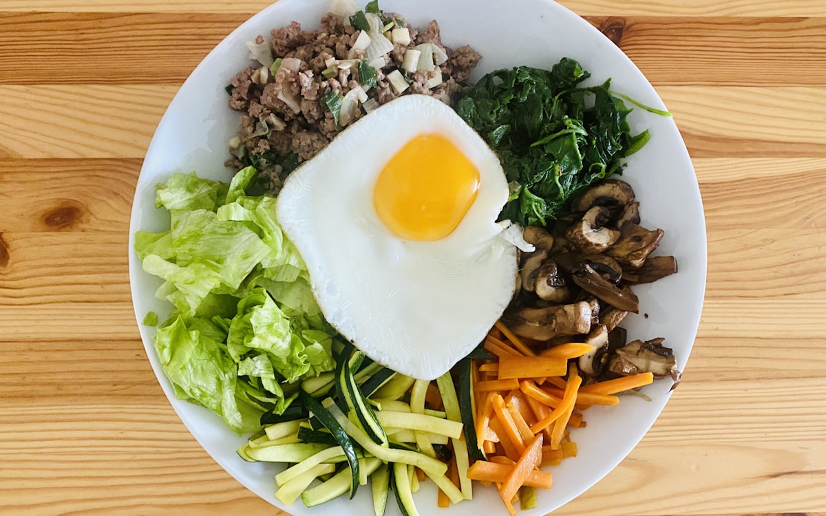 Egg on white ceramic plate
