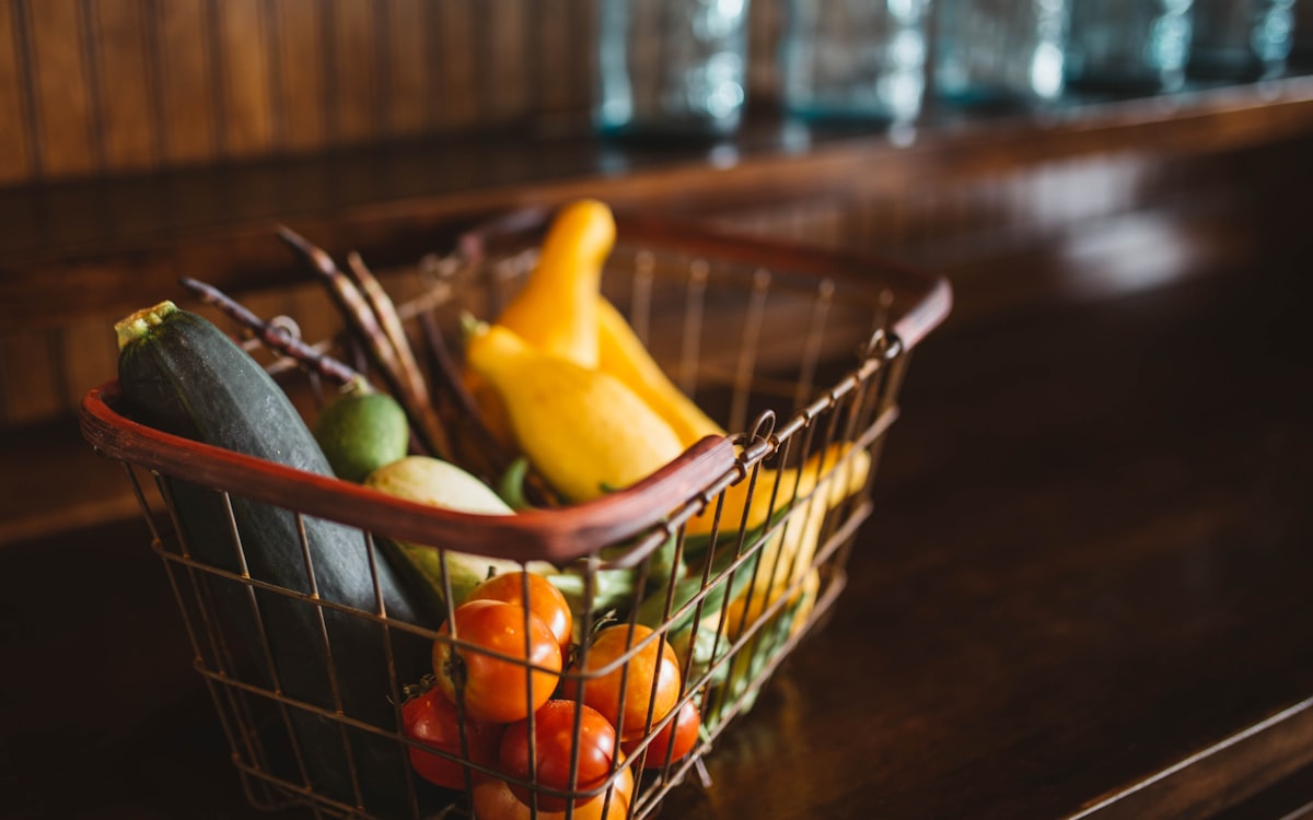 Selective focus photography of vegetables in basket
