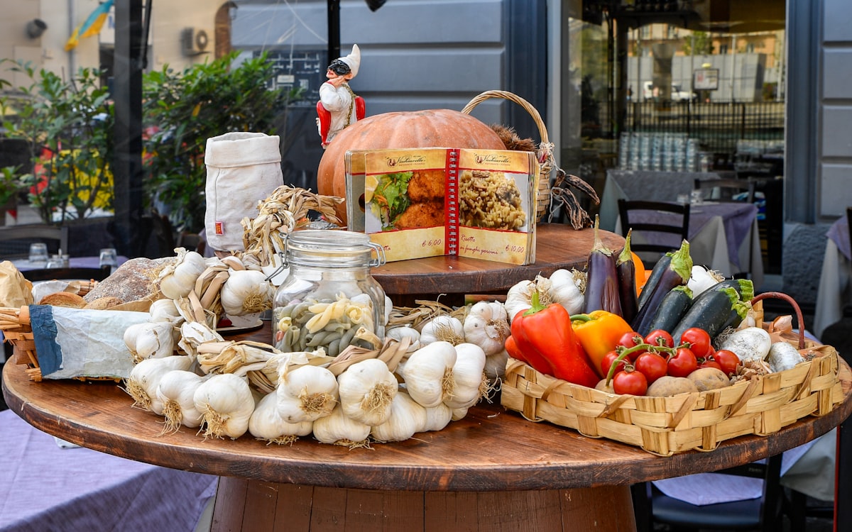 Fresh vegetables and garlic arranged on a table